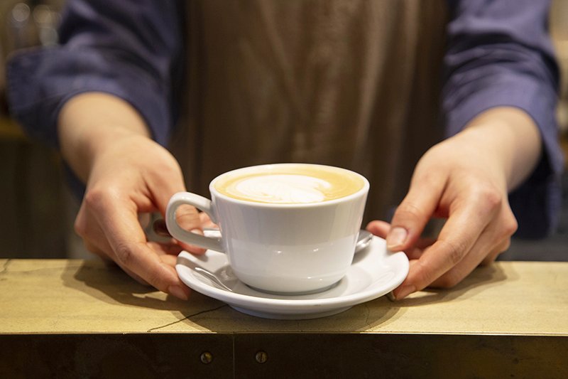 丸山珈琲のコーヒー豆を使用するカフェラテ